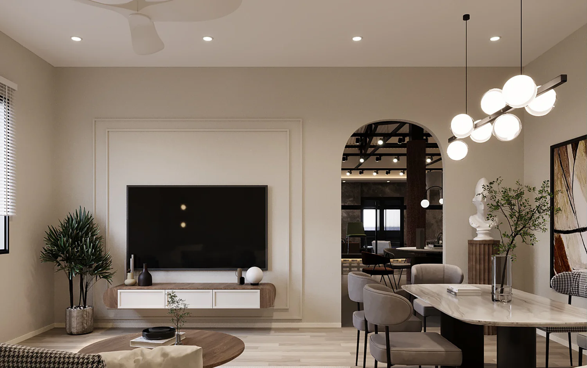 Modern living room with a television, decor items, and a dining table.